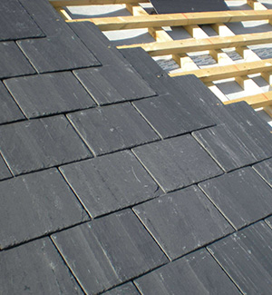 Part way through a slate roof in Wigan